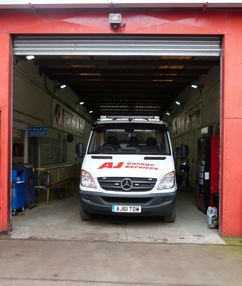 AJ van in the workshop bay